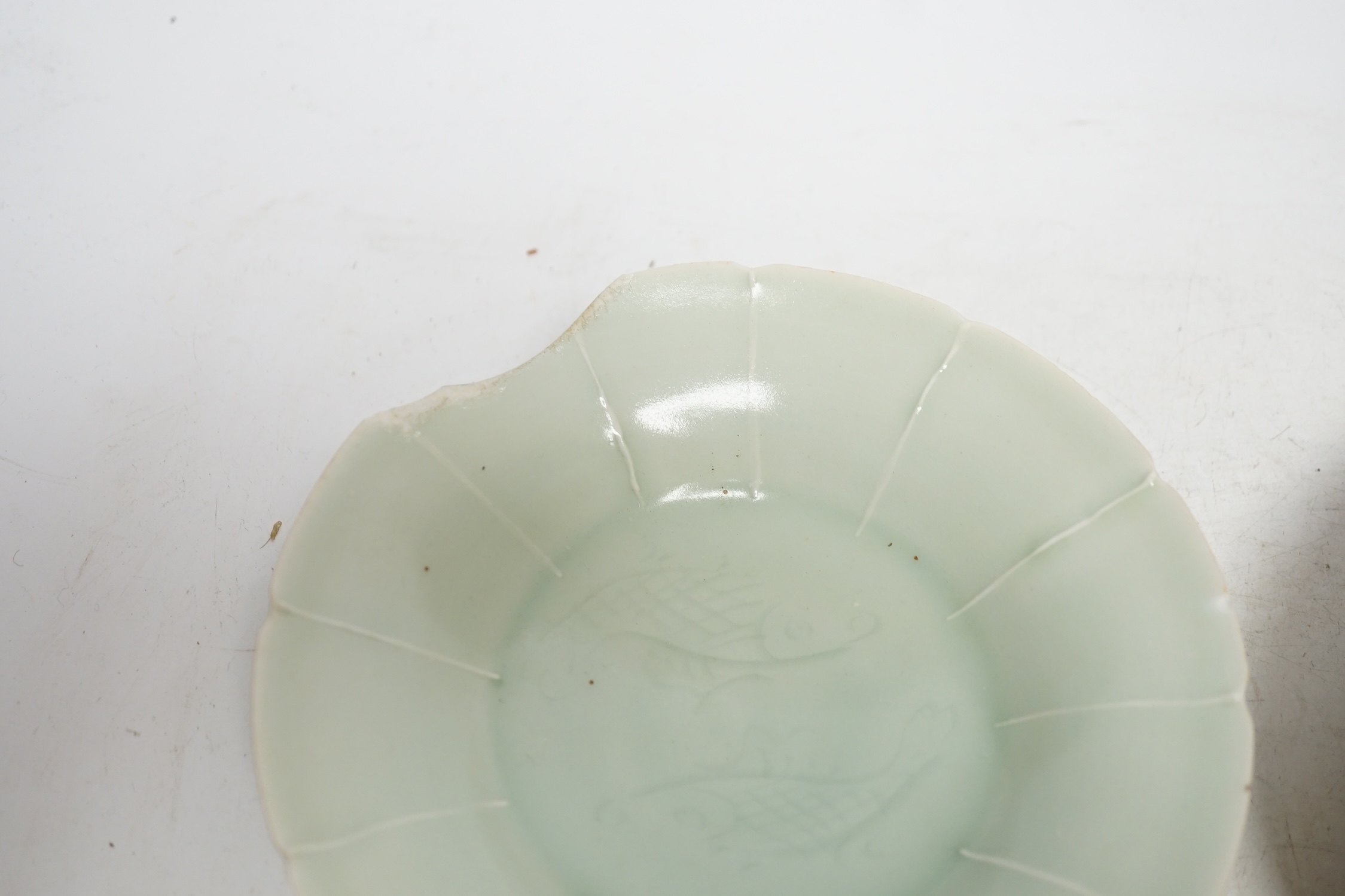 Two Chinese qingbai dishes and a Yue ware bowl, Song-Yuan dynasty, widest 17cm diameter